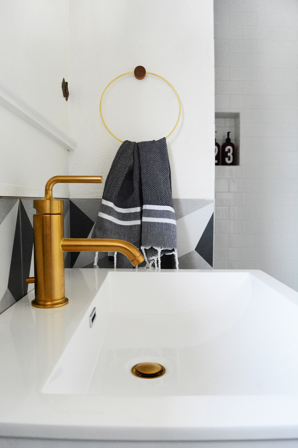 Guesthouse Bathroom Reveal - modern patterns and vintage touches create a bold bathroom. 